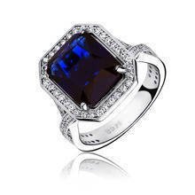 Silver fashionable (925) ring with sapphire colored zirconia