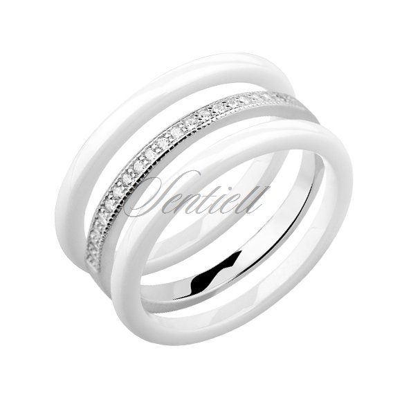 Two white ceramic rings and silver ring with zirconia