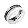 Two ceramic rings black and white and silver ring with zirconia